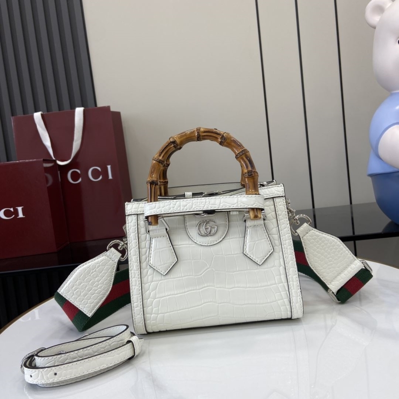 G*u*i top handle bags